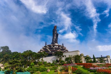 Ba Den mountain tourist area, Tay Ninh province, Vietnam. The tourist area has unique Buddhist architecture with the highest elevation in the area view from below is very beautiful clipart