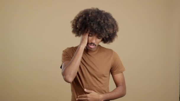 Studio Image Young Man Hand Forehead Expressing Headache Stomachache — Stockvideo