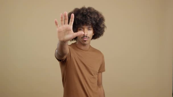 Serious African Man Gesturing Prohibition Hand Studio Stop Concept — Αρχείο Βίντεο