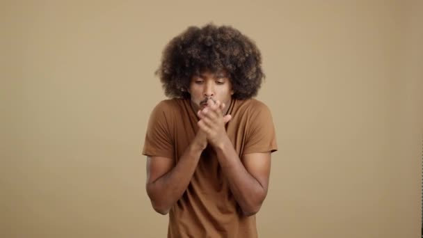 African Man Curly Hair Looking Camera Cold Studio — Stockvideo