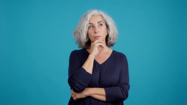 Studio Video Blue Background Aged Caucasian Woman Looking Expression Disgust — Wideo stockowe