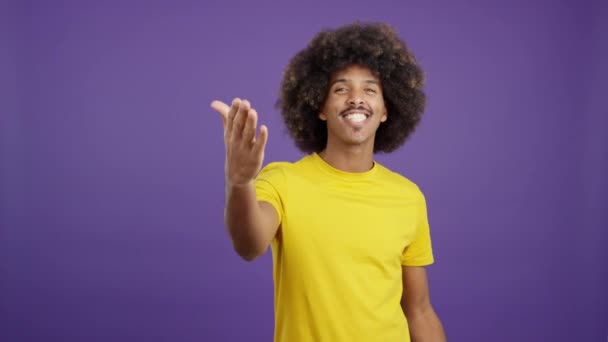 Stylish African Man Blowing Kiss Studio Purple Background — Vídeo de Stock