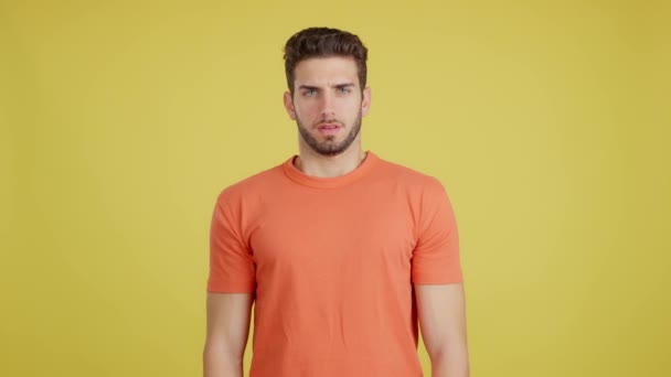 Caucasian Man Making Pity Face Ask Something Studio Yellow Background — Vídeos de Stock