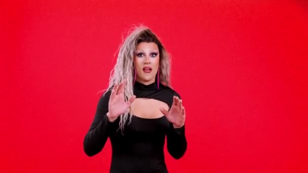 Transgender Person Gesturing Hands Fear Studio Red Background — Vídeos de Stock