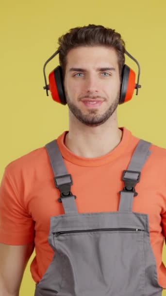 Friendly Caucasian Man Carpentry Worker Work Uniform Studio Yellow Background — Stock Video