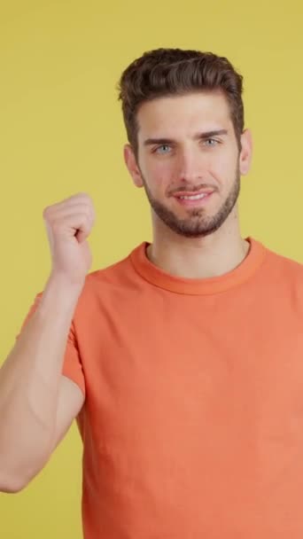 Happy Caucasian Man Gesturing Agreement Raising Thumb Studio Yellow Background — Stock Video