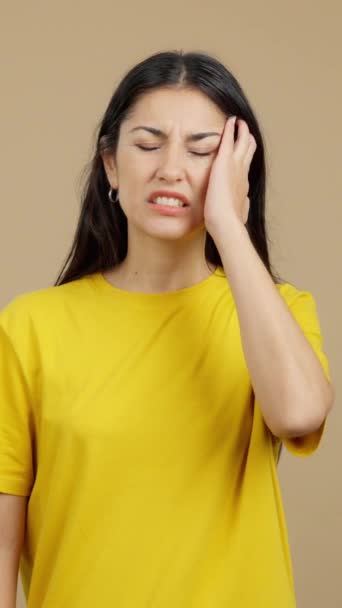 Caucasian Woman Gesturing Bodily Discomfort Headache Studio Brown Background — Vídeos de Stock