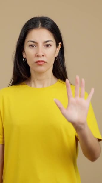 Caucasian Woman Gesturing Prohibition Hand Studio Brown Background — Vídeo de Stock