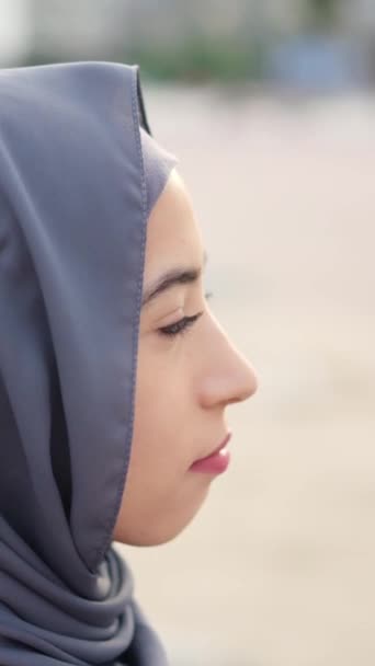 Serious Muslim Woman Hijab Starts Smile Outdoors — Stock Video