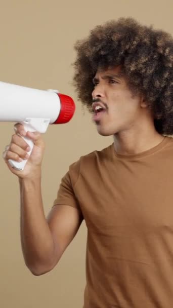Upset African Man Curly Hair Shouting Using Loudspeaker Studio — Video Stock