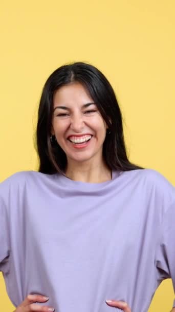 Happy Hispanic Woman Laughing Looking Camera Studio Yellow Background — Vídeos de Stock