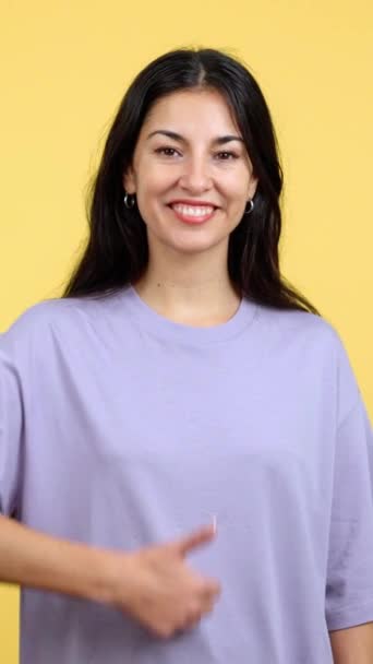 Happy Caucasian Woman Gesturing Agreement Raising Thumb Studio Yellow Background — Wideo stockowe