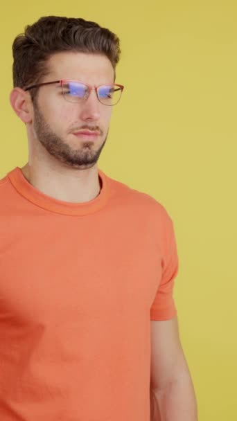 Caucasian Man Taking Her Glasses See Far Away Studio Yellow — Stock Video