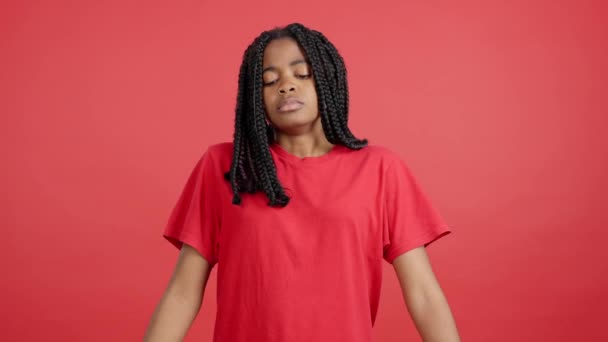 Sad African Woman Standing Looking Camera Studio Red Background — Stock Video