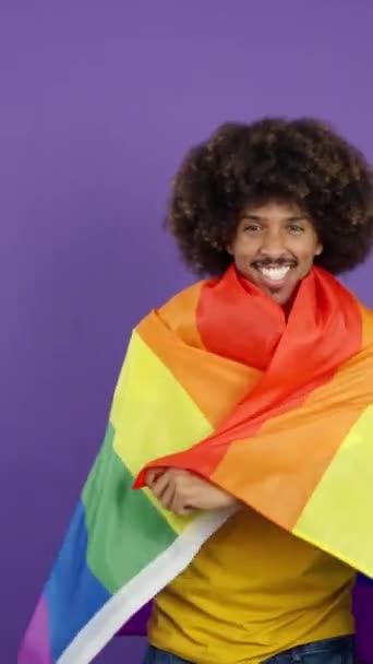 Happy African Man Smiling Camera Wrapped Lgbt Flag Studio — Video Stock