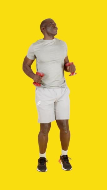 Video Studio Yellow Background Funny African Sportive Man Dancing Bachata — Stock Video