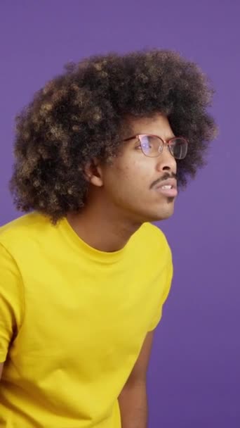 Studio Video Purple Background Man Afro Hair Taking Her Glasses — Stock Video