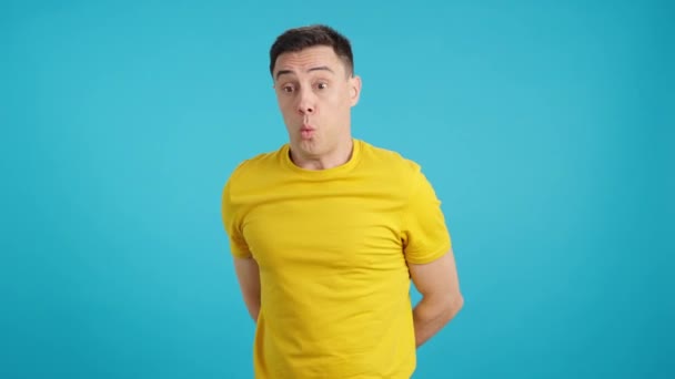 Video Studio Blue Background Caucasian Casual Man Standing Whistling Absent — Stock Video