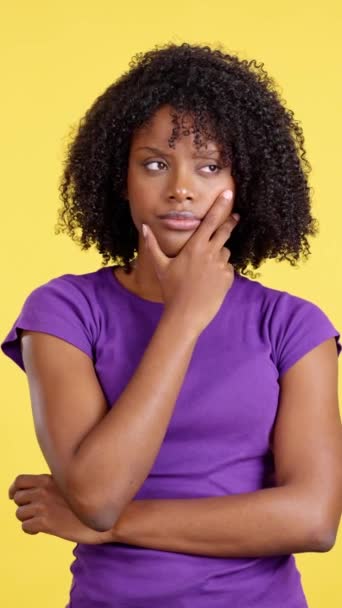 Woman Afro Hair Standing Thoughtful Expression Studio Yellow Background — Vídeos de Stock