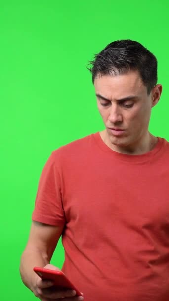 Man Looking Mobile Worried Has Received Message Does Red Shirt — Stock Video