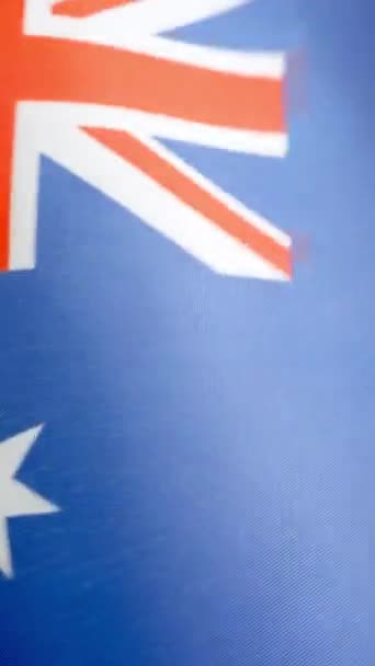 Vertikal Slow Motion Video Studio Australiska Flaggan Viftar Med Vinden — Stockvideo