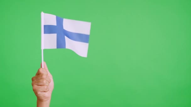 Wind Waving Finnish Pennant Holding Hand Slow Motion Video — Stock Video