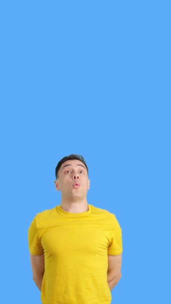 Video Studio Blue Background Caucasian Casual Man Standing Whistling Absent — Stock Video