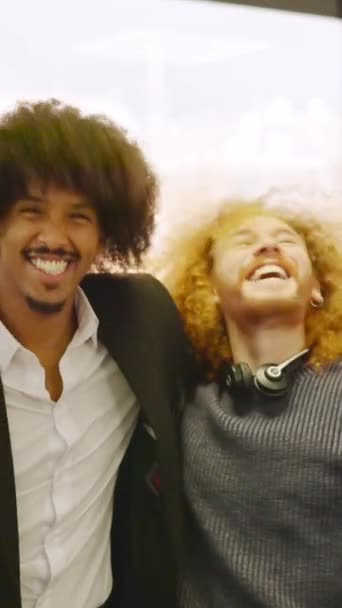 Slow Motion Video Two Coworkers Curly Hair Embracing Smiling Camera — Stock Video
