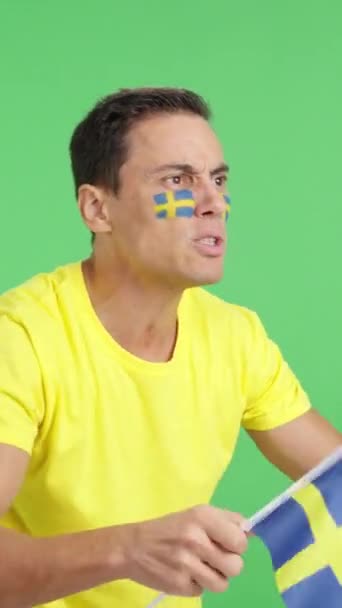 Video Studio Chroma Man Looking Away Waving Swedish National Flag — Stock Video
