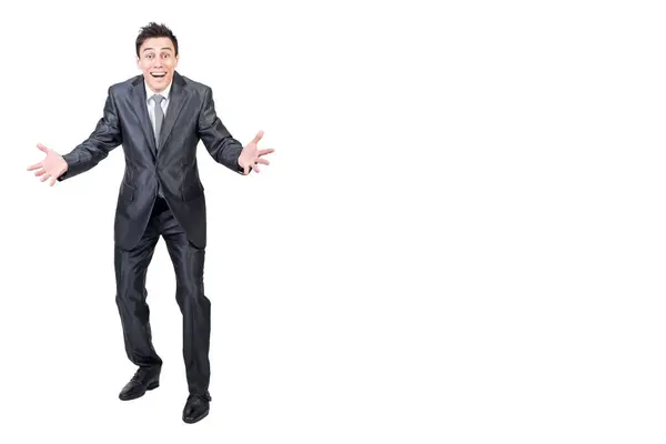 stock image Full body of cheerful male in formal suit looking at camera with outstretched arms while celebrating victory isolated on white background