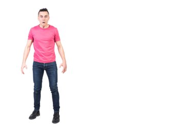 Full body of surprised male in casual wear looking at camera with opened mouth isolated on white background in light studio clipart