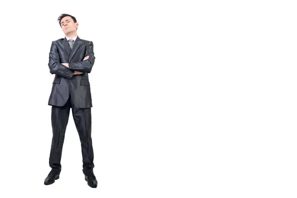 stock image Full body of over proud male in formal suit looking at camera with crossed arms isolated on white background in studio