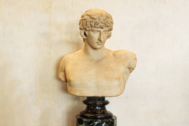 Florence, Italy, January 4, 2024: Bust with the head of Antinous. Uffizi Gallery, Florence clipart