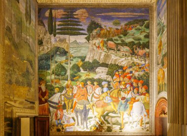 Florence, Italy, January 5, 2024: The Procession of the Magi. Benozzo Gozzoli. Chapel of the Medici Riccardi Palace, West wall clipart