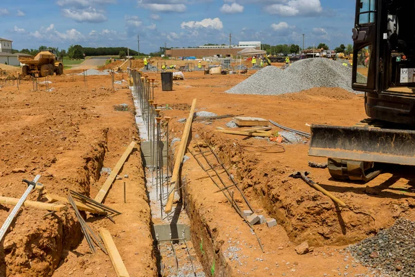 stock image Throughout construction site steel bars rebar wires have been placed into trench to reinforce concrete foundation