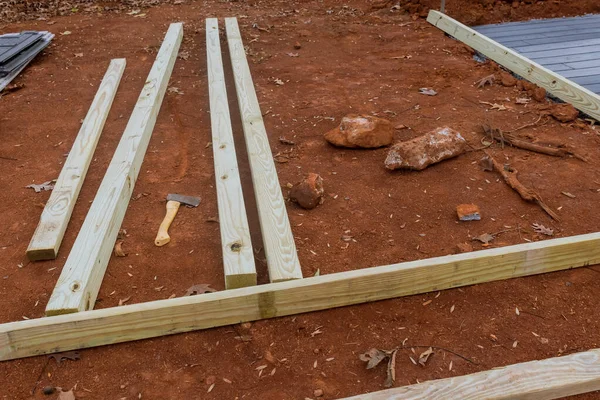 Building wood deck foundation for small shed in backyard
