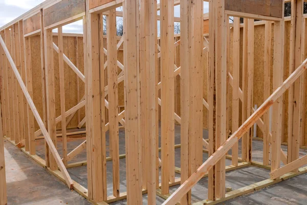 Construction of beam built home with wooden framework frame house is currently in progress