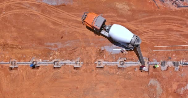 Worker Pouring Concrete Trench Using Mixer Truck Prepares Going Build — Stock Video