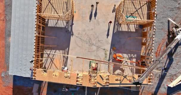 Installing Construction Framework Rafters Unfinished Wooden Structure Crane Holding Beams — Stock Video