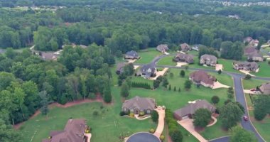 View from an aerial perspective roofs small American town in summertime of South Carolina United States