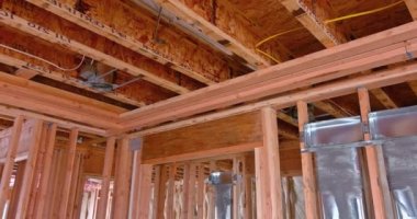 There is process that must be followed before plasterboard is applied to new building under construction, including installation of all communications and thermal insulation