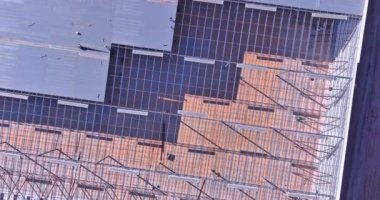 Metal framed warehouse roof truss is currently under construction on building site includes steel framework