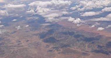 Aerial view fluffy clouds picturesque landscape mountains state New Mexico with range desert mountains in USA breathtaking view fluffy clouds