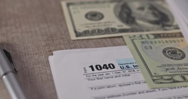 American Dollar Bill Pen Calculator 1040 Individual Tax Form Placed — Video Stock