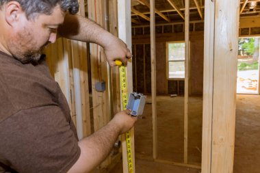 Electrical socket boxes inside construction new residential of framing an unfinished wood frame