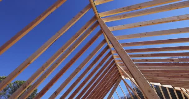 Roof construction details from roofing worker who is working on building of new house