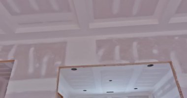 In new construction of house plastering drywalling has been completed is ready for painting once it is completed