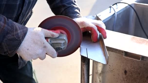 Worker Uses Grinder Cut Metal Sparks While Grinding Iron Grinder — Stockvideo