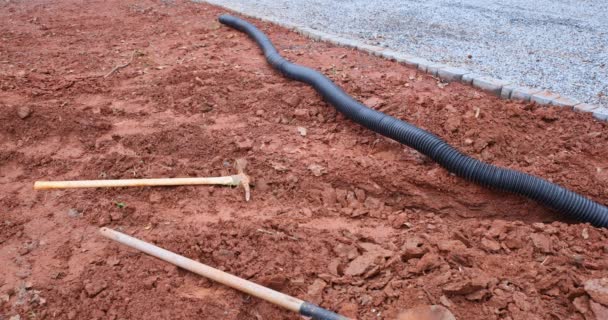 Worker Digs Trench Order Lay Drainage Pipes Rainwater Times Heavy — Vídeo de Stock