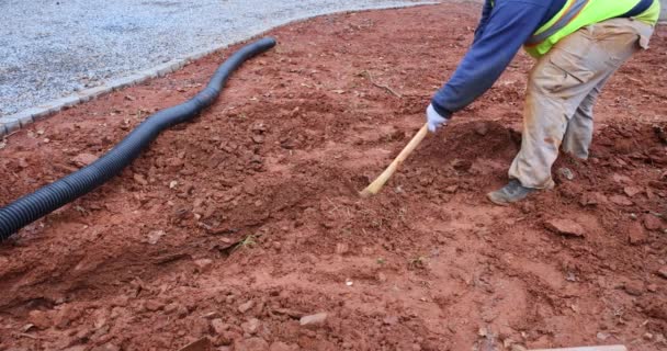 Rain Heavy Worker Digs Trench Lay Drainage Pipes Rainwater Period — Vídeo de stock